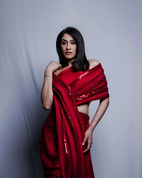 Regena Works Her Magic in a Red Sequin Look
