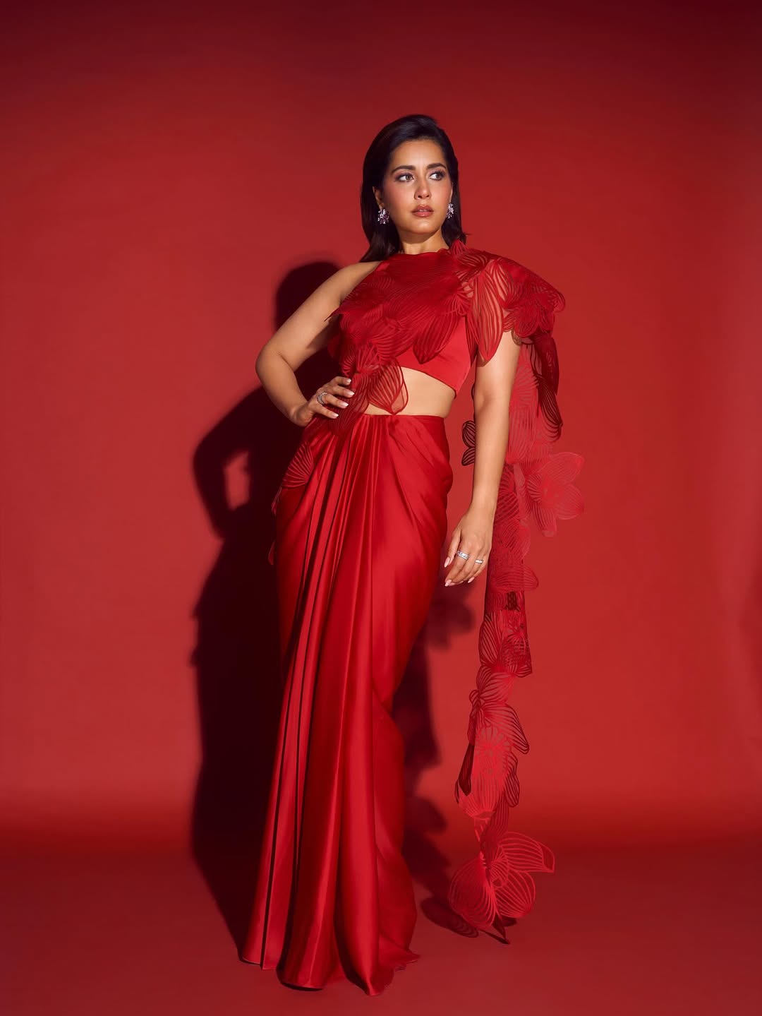 Raashi Khanna stuns in fiery red elegance!