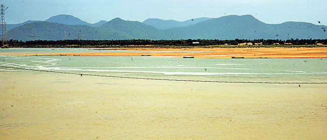 Floodwaters Disrupt Access to Temple, Two-Toned Godavari Creates Stunning Visual