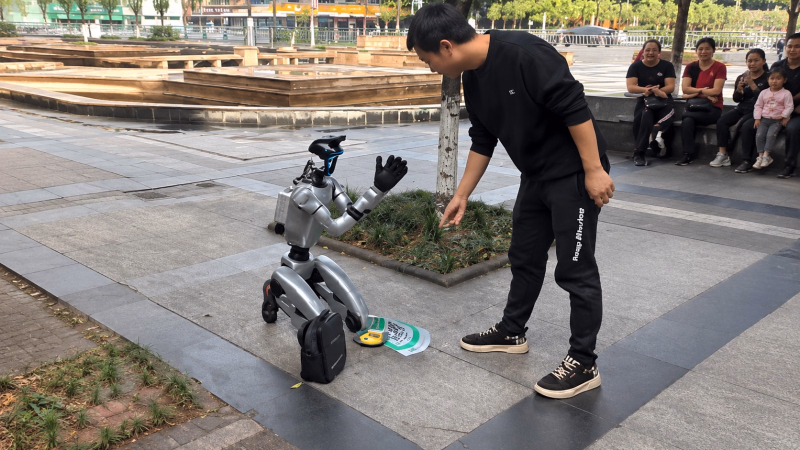 Robot Seen “Begging” on Streets Goes Viral in China
