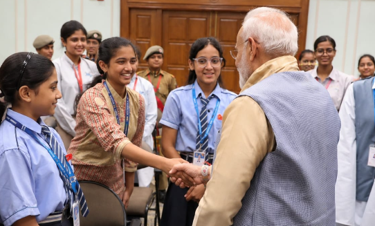 Telugu Student Sai Madhumitha Ties Rakhi to PM Modi